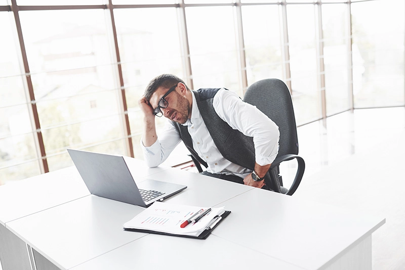 Frustrated business owner reviewing financial records — representing the extra work tax professionals face when client books are incomplete or disorganized.
